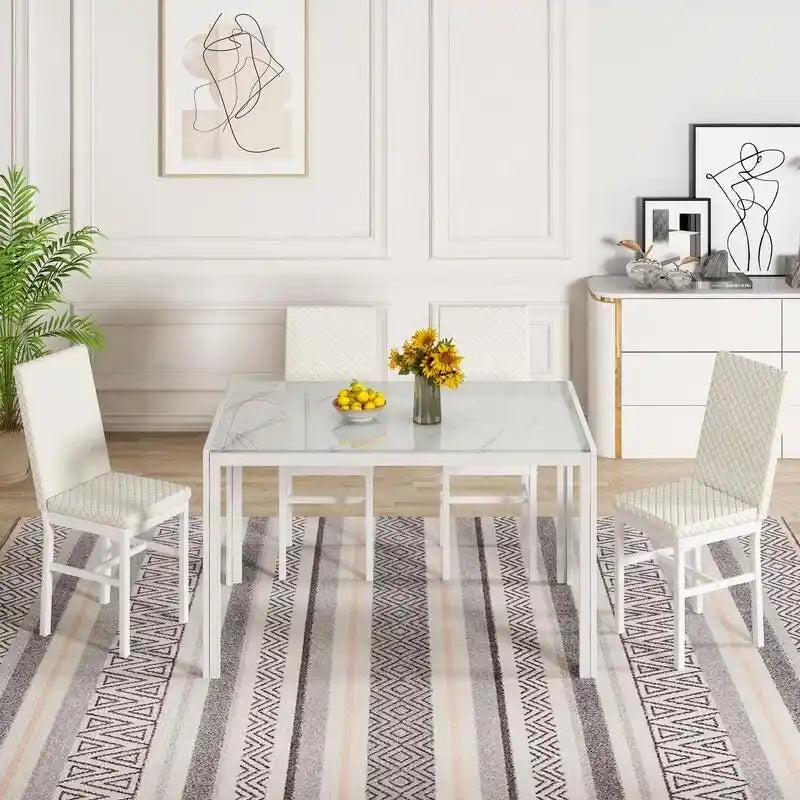 Table de salle à manger moderne avec plateau en verre trempé et chaises en cuir PU avec surpiqûres diamant